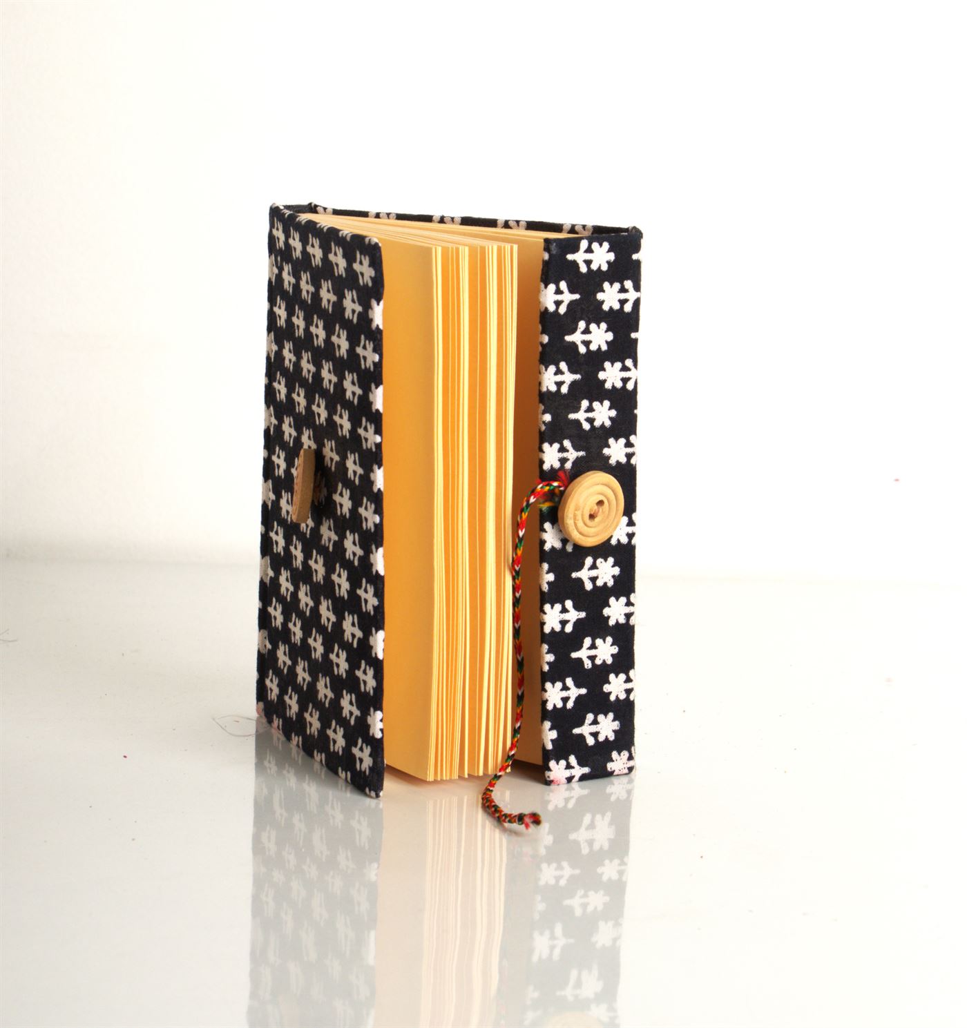 Black handmade diary with white pattern fabric cover and buttoned flap - Image 3